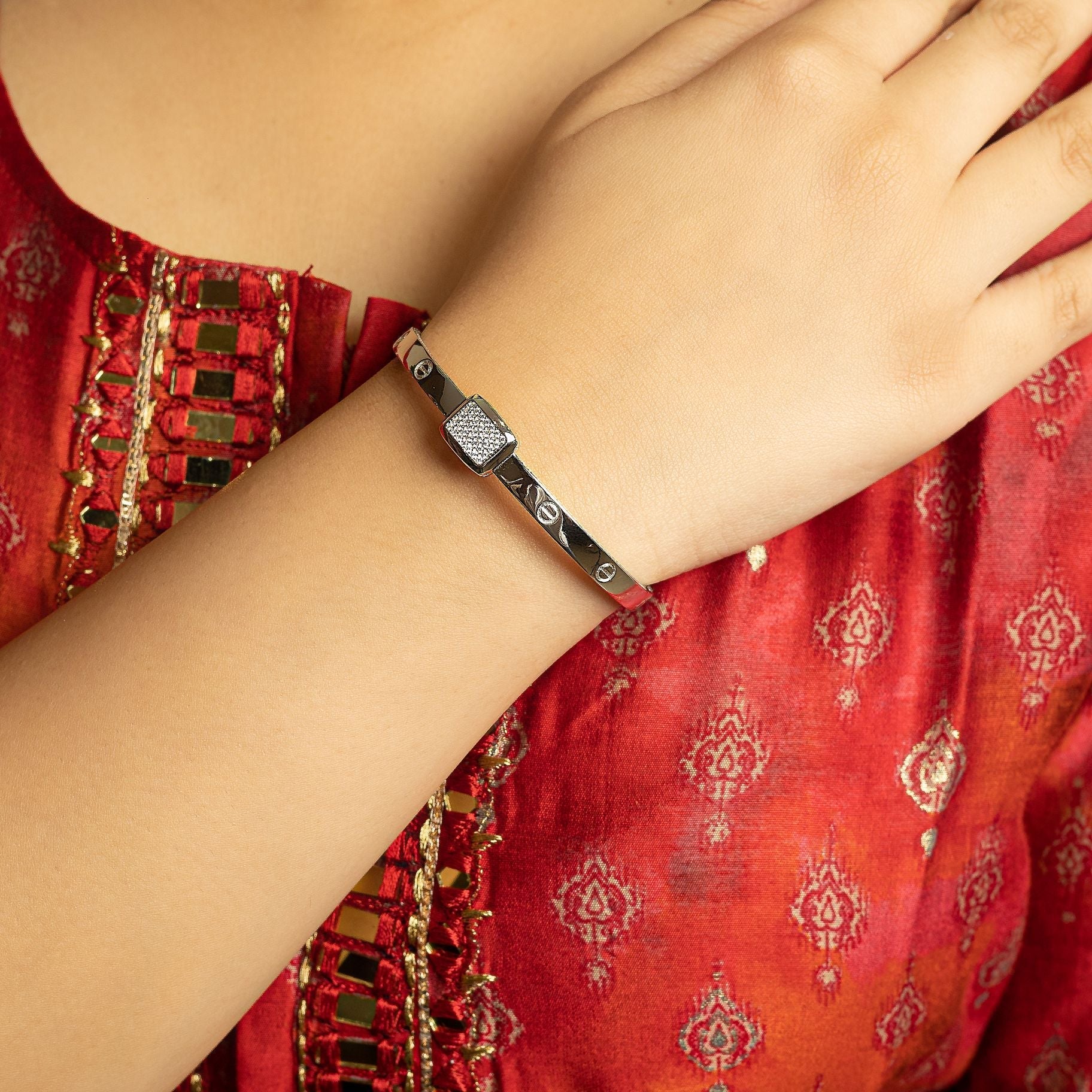 Alluring Stone Studded Bangle silverhousebyrj