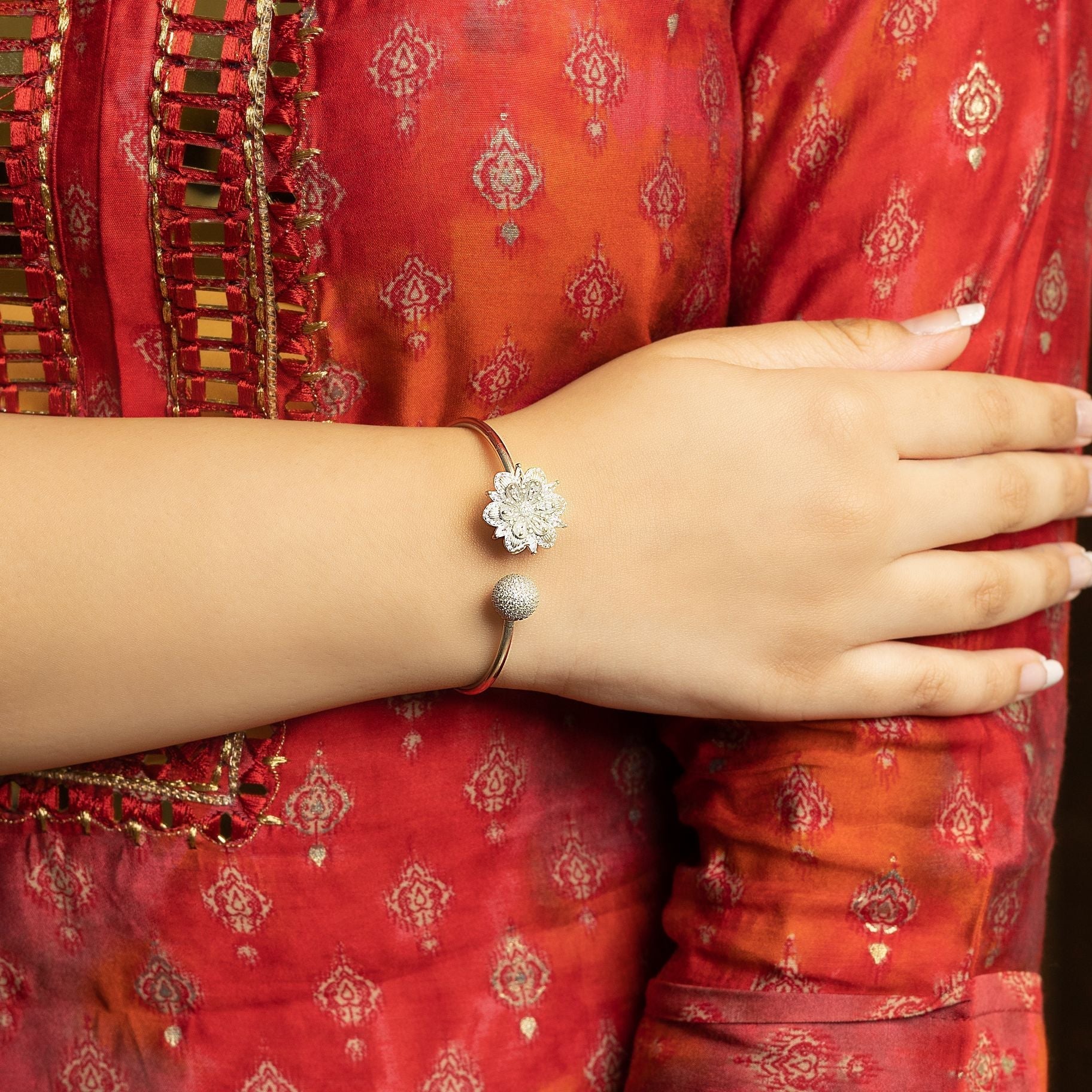 Delightful Flower & ball studded at both the ends of bangle silverhousebyrj