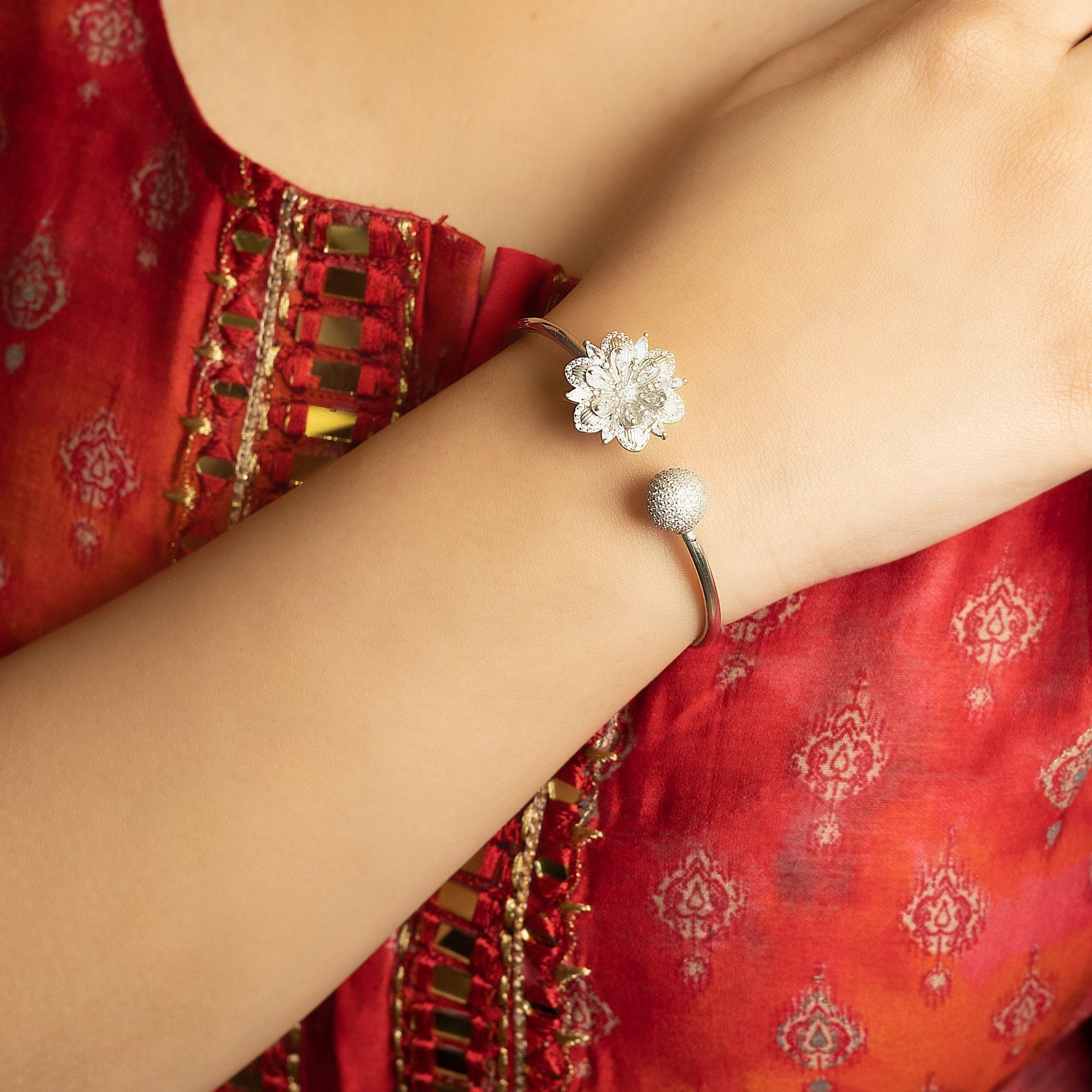 Delightful Flower & ball studded at both the ends of bangle silverhousebyrj