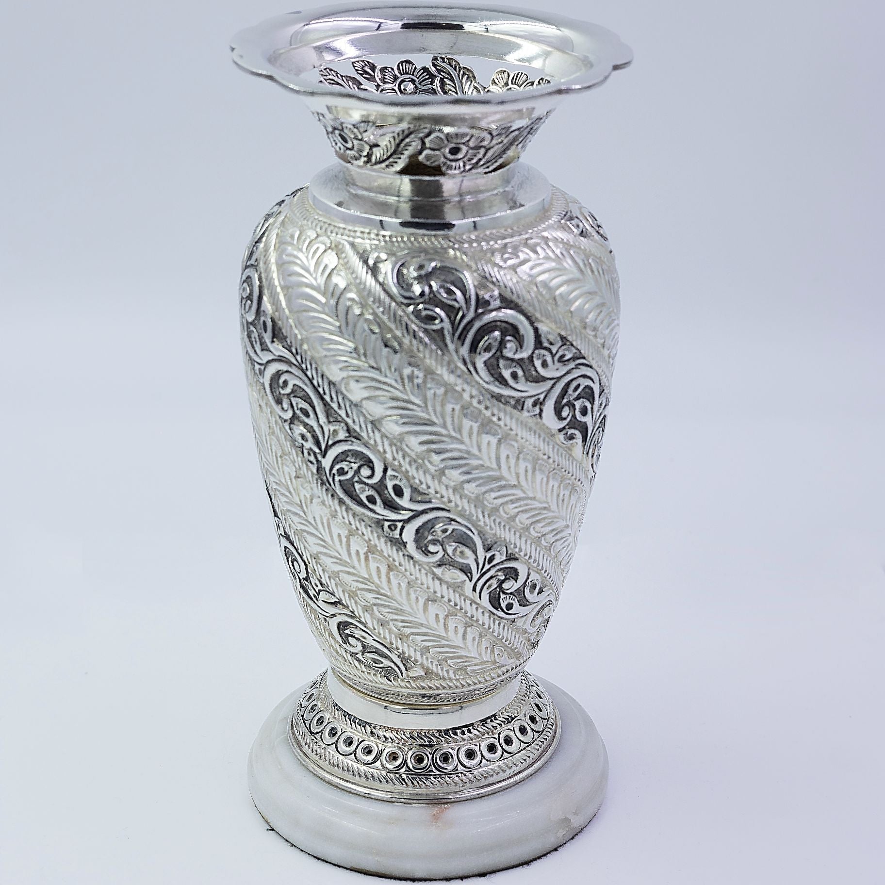 Alluring carved vase with Attractive stone Base silverhousebyrj