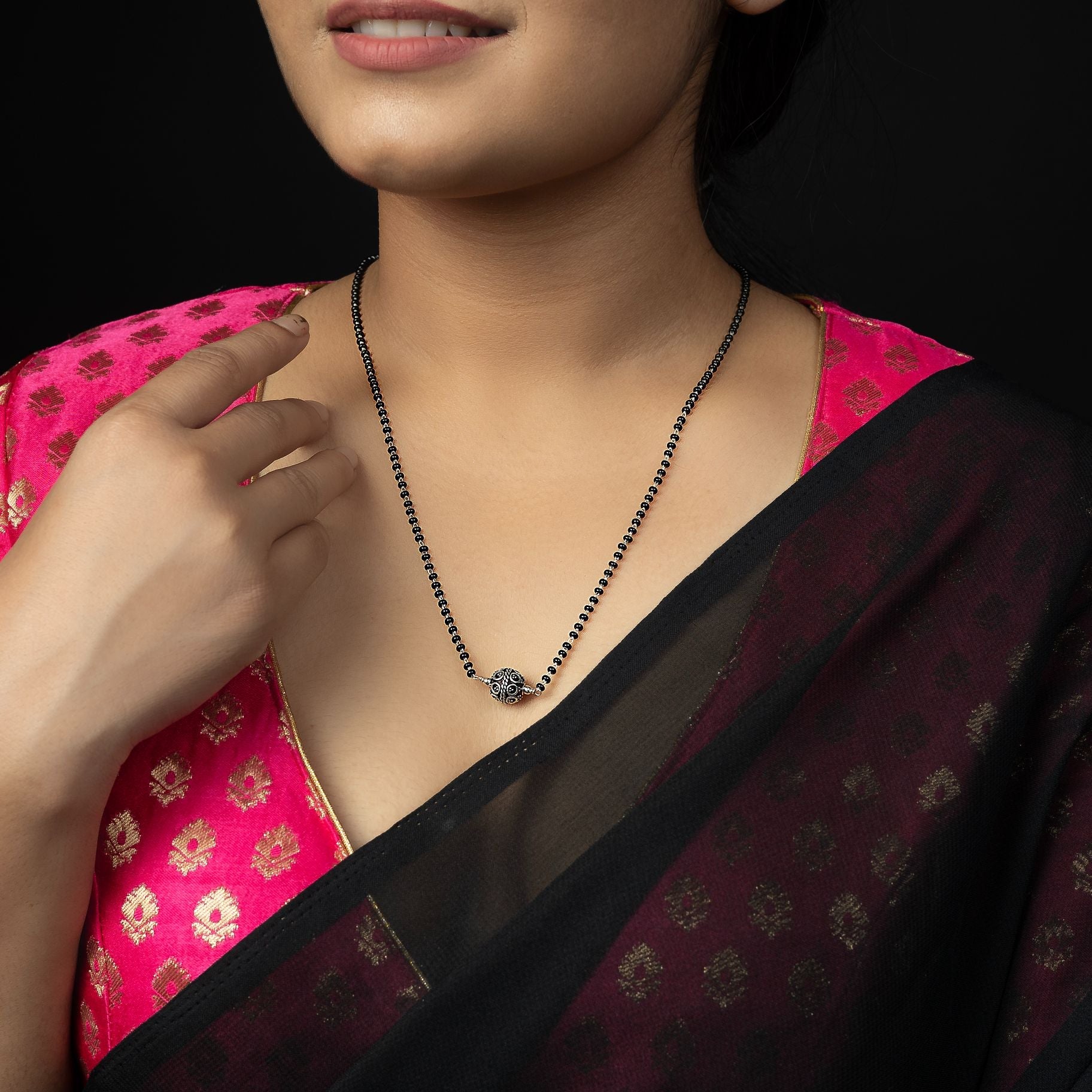 Red hot sale moti mangalsutra