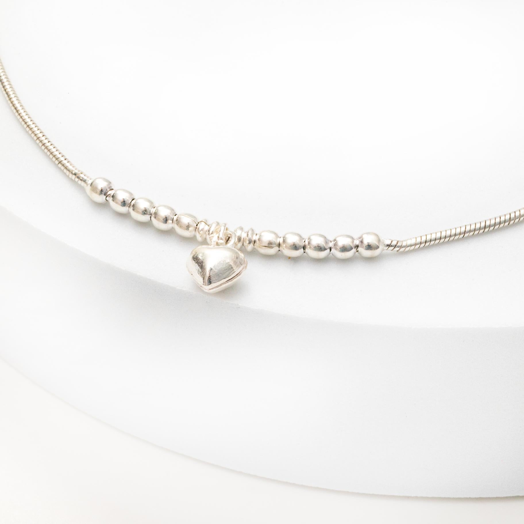 Sleek Anklet with hanging charms